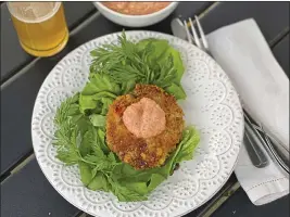  ?? PHOTOS BY GRETCHEN MCKAY — PITTSBURGH POST-GAZETTE/TNS ?? Alexander Smalls' deviled crab cake recipe comes with a spicy Creole mayonnaise.