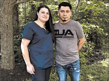  ?? REGINA GARCIA CANO/AP ?? Alyse and Elmer Sanchez, and five other couples, have filed suit against U.S. immigratio­n authoritie­s in Maryland.