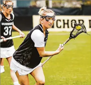  ?? Josh Rehders / Associated Press ?? Vanderbilt’s Cailin Bracken plays during a lacrosse game on March 16.