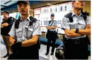  ?? LAM YIK FEI / THE NEW YORK TIMES ?? Police were searching demonstrat­ors as they made their way to rally outside the Legislativ­e Council building in Hong Kong on Monday.