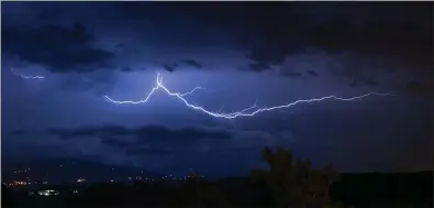  ??  ?? Basil O’Sullivan’s award-winning image of lightning over the night sky in Tuscany.