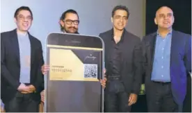  ??  ?? (Left to Right) Sanjeev Kumar Bijli, Aamir Khan, Ajay Bijli and Kamal Gianchanda­ni launching the PVR Privilege card