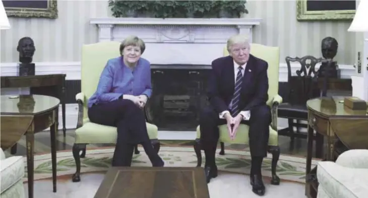  ??  ?? WASHINGTON: US President Donald Trump meets German Chancellor Angela Merkel in the Oval Office of the White House yesterday. —AP