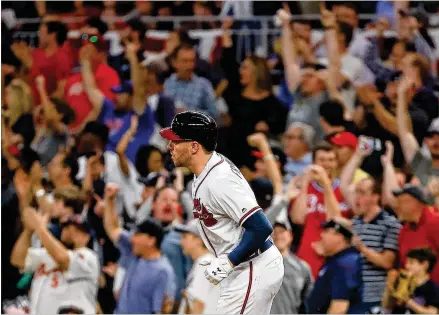  ?? KEVIN C. COX / GETTY IMAGES ?? The Braves open a 10-game homestand tonight before finishing the season with six on the road. The Braves are closing in on their first division title and playoff berth since 2013, which would give them more opportunit­ies to play at SunTrust Park.