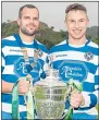  ??  ?? Newtonmore’s Evan Menzies and Andy Mackintosh with the Cup 12 months ago