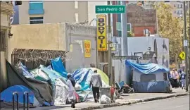  ?? Genaro Molina Los Angeles Times ?? IF ALL members of the City Council adhere to the 222-unit pledge, it would ensure that at least 3,330 units for the homeless are approved over three years.