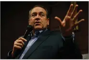  ?? (AP/Kiichiro Sato) ?? Former Arkansas Gov. Mike Huckabee speaks at a presidenti­al campaign appearance in January 2016 in West Des Moines, Iowa. The former candidate is now doling out campaign cash to U.S. House and Senate candidates through his Huck PAC to the tune of nearly $1.9 million.