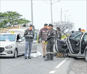  ?? ÁLEX LIMA / EXPRESO ?? Tragedia. Escena en la que el agente y su compañero fueron asesinados.