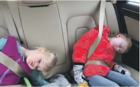  ?? Melissa Gronlund ?? Melissa Gronlund’s kids take a nap in the car in New York