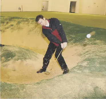  ??  ?? 0 Then assistant pro Brian Mason in a practice bunker at the now-closed indoor centre at Drumoig.