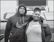  ?? Submitted photo ?? (left), an offensive lineman prospect from Phenix City, Ala., looks up to his mother Philecia Fuller, who works two jobs to provide for Cohen, his two sisters, niece and two nephews. Cohen is expected to visit Arkansas on March 9.