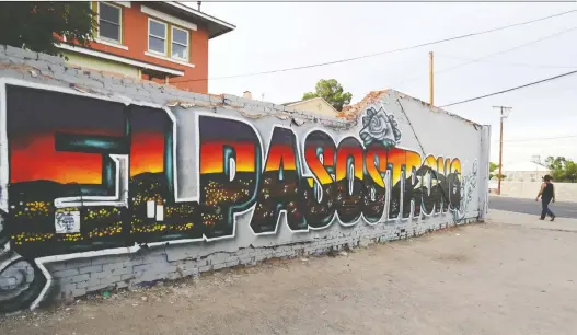  ?? MARIO TAMA/GETTY IMAGES ?? An El Paso Strong mural is one sign of a community working through the healing process following the mass shooting Aug. 3 that killed 22 people.