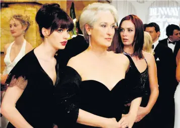  ??  ?? SCHEMING Meryl Streep as Miranda Priestly and Anne Hathaway as her assistant in the film The Devil Wears Prada. Far left, Emily Blunt as Emily, the harried first assistant