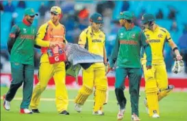  ?? REUTERS ?? Two rainabando­ned matches have put strong contenders Australia in a spot of bother .