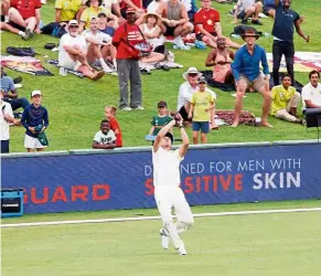  ?? — reuters ?? Superb catch: south africa’s dwaine Pretorius takes a catch to dismiss england’s Jos buttler during the first Test at the supersport Park, centurion, south africa on sunday.