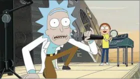  ?? TURNER NETWORKS ?? Rick, left, and Morty perform the song “Get Schwifty” to save the world in season two of “Rick and Morty.”