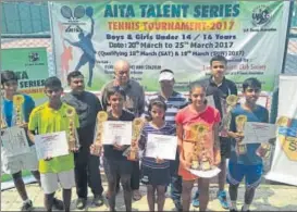  ?? HT ?? Winners at AITA tourney pose with their trophies and certificat­es in Lucknow on Friday.