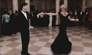  ?? RONALD REAGAN LIBRARY VIA AP ?? Actor John Travolta dances with Princess Diana at a White House dinner in Washington on Nov. 9, 1985.