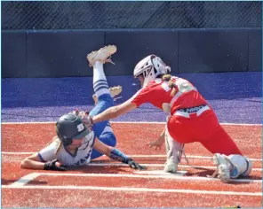  ?? TONY LENAHAN/THE Saline Courier ?? Bryant sophomore Kloie Lovell slides in safely for the first run of the game in the Lady Hornets 8-5 victory over Cabot in the 6A state title game Thursday at Farris Field in Conway.