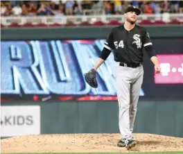  ?? JIM MONE/AP ?? Sox starter Ross Detwiler reacts after giving up a 482-foot three-run home run to the Twins’ Miguel Sano in the third inning Tuesday.