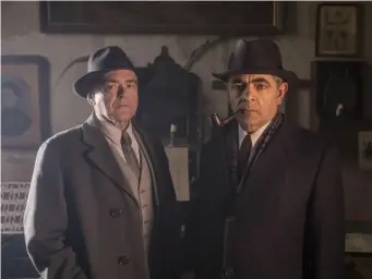  ??  ?? Kevin R McNally and Atkinson in ITV's adaptation of the bestsellin­g crime novels by Georges Simenon