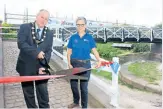  ?? ?? Middlewich Town Council chairman Coun Mike Hunter with project manager Tania Snelgrove at the reopening of the bridge.