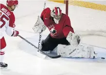  ?? PETER POWER/ THE CANADIAN PRESS ?? Michael DiPietro, making a save against Denmark’s Magnus Molge during exhibition play Friday in St. Catharines, Ont., was the biggest omission when Canada announced its roster.