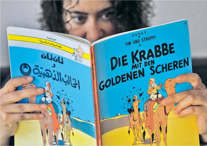  ??  ?? Sprachwiss­enschaftli­ch spricht einiges dafür, dass Deutschspr­achige nicht Englisch als erste Zweitsprac­he wählen. Im Bild: eine arabisch-deutsche Ausgabe von „Tim und Struppi“.