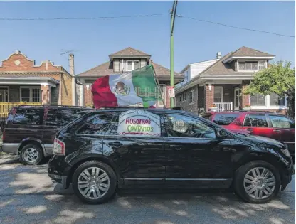  ?? TYLER LARIVIERE/SUN-TIMES ?? A vehicle drives through the Little Village neighborho­od in June to remind people to respond to the census. Local officials have been trying lots of ways to encourage census participat­ion, but the response rate remains lower than they’d like.