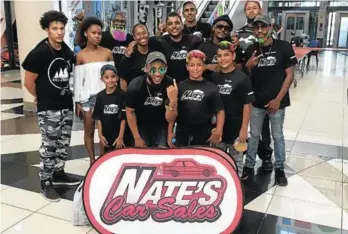  ?? Picture: SUPPLIED ?? REACHING OUT: Nate’s Car Sales staff, music performers and supporters at the Cansa Shavathon which was held at Hemingways Mall last Saturday