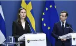  ?? ?? Finland's Prime Minister Sanna Marin, left, and Sweden's Prime Minister Ulf Kristersso­n at a press conference in Stockholm, 2 February 2022