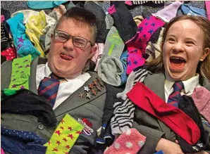  ?? ?? ●●Whitworth Community High School students Michael Simpson and Gabriella Greenwood prepare to celebrate World Down Syndrome Day.