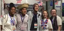  ?? PROVIDED TO CHINA DAILY ?? Lynchelle Siu (left), Christa Lackey (second right) and Kyla Eastman (right) from Lincoln High School in Tacoma, Washington, pose with students from Bolivia at the U.S. booth of the Shanghai Internatio­nal Youth Interactiv­e Friendship Camp in Shanghai in 2019.