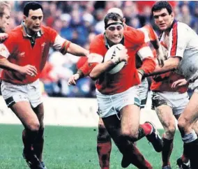  ??  ?? Emyr on the charge for Wales against England in 1995