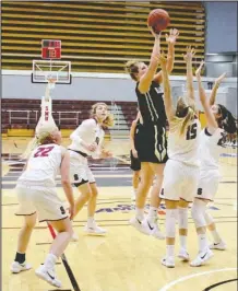  ?? Submitted photo ?? TWO FOR DOUBLE: Harding freshman Kellie Lampo, of Jessievill­e, rises for two of her 11 points in a 77-76 loss Thursday to Southern Nazarene in Bethany, Okla. Harding plays again today at Oklahoma Baptist. Photo courtesy of Harding Athletics.