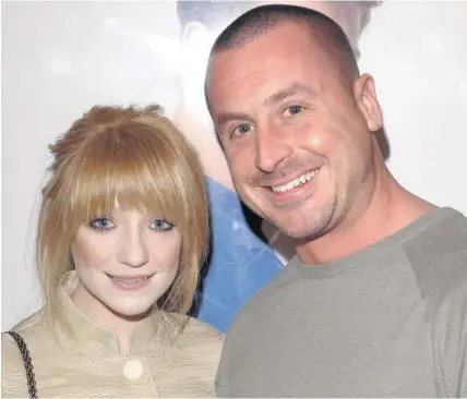  ?? David Fisher/REX ?? > Nicola Roberts and Carl Davies in 2007, before their break up in 2008