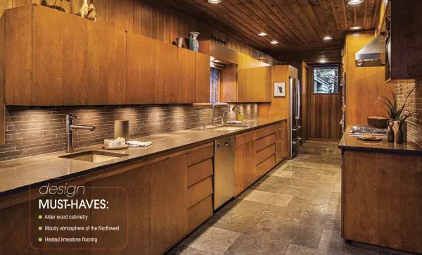  ??  ?? TOP: TEXTURE PLAYS A HUGE ROLE IN A MONOCHROMA­TIC KITCHEN. WHILE THE ORIGINAL CABINETRY ALONG THE SINK WALL IS SMOOTH, THE LIMESTONE FLOOR DESIGN, NEW BACKSPLASH AND ORIGINAL WOOD PANELING ON THE WALLS AND CEILING HELP BREAK UP ALL THE WOOD TONES.