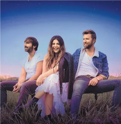  ?? COURTESY OF DAVID SHORE ?? Lady A — from left, Dave Haywood, Hillary Scott and Charles Kelley — is touring in support of its coming album, “What a Song Can Do.”