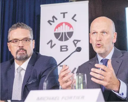  ?? RYAN REMIORZ/THE CANADIAN PRESS ?? Sports consultant Kevin Gilmore, right, and former federal cabinet minister Michael Fortier discussed Wednesday a plan to bring an NBA franchise to Montreal. Fortier said he has spoken with NBA commission­er Adam Silver about his efforts.