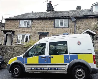  ?? Matt Ratcliffe ?? Police outside the house in Mellor where the woman’s body was found