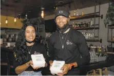  ?? Courtesy Eat. Learn. Play. ?? Stephen and Ayesha Curry visited Oakland’s Kingston 11 Restaurant and prepared meals with World Central Kitchen.