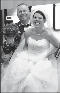  ?? Tammy Belin Photograph­y ?? Robbie and Sabrina McDonald were married on July 6, 2013. Both were widowed young and feel fortunate to have found love again. They make every effort to honor their marriage as well as their pasts. “They’re always a part of our life,” Sabrina says of...