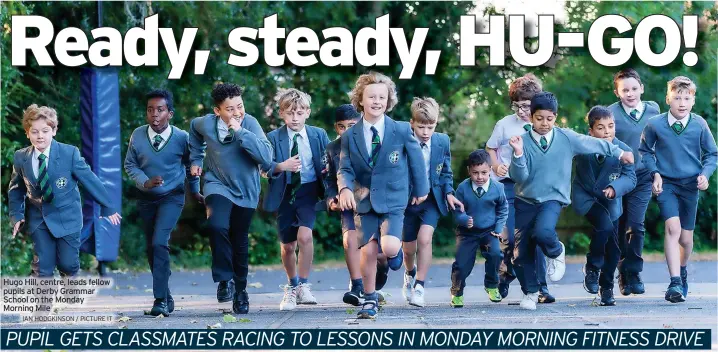  ?? IAN HODGKINSON / PICTURE IT ?? Hugo Hill, centre, leads fellow pupils at Derby Grammar School on the Monday Morning Mile