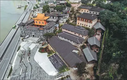  ?? PROVIDED TO CHINA DAILY ?? Top: An aerial view of the compound of Anderson Firm which has been renovated into a memorial site.