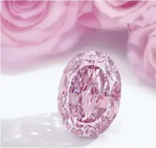  ?? Sotheby’s ?? The fancy, vivid and flawless stone weighs 14.83 carats