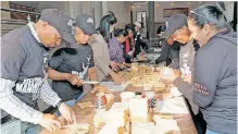  ?? | Supplied ?? SEVA Hands volunteers and staff from Transnet prepare sandwiches for children at a Reservoir Hills school.