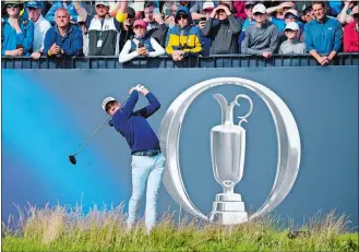  ?? JON SUPER/AP PHOTO ?? Justin Thomas plays from the 8th tee on the first day of the British Open Golf Championsh­ips on Friday at the Royal Liverpool Golf Club in Hoylake, England.