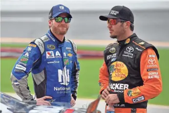  ?? JASEN VINLOVE, USA TODAY SPORTS ?? Dale Earnhardt Jr., left, has given opportunit­ies to countless drivers, including Martin Truex Jr., right, and others hoping to make it in the racing industry.