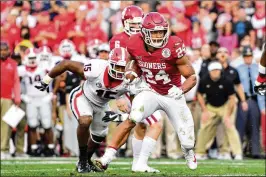  ?? HARRY HOW/GETTY IMAGES ?? Oklahoma running back Rodney Anderson ran for nearly 1,200 yards and 13 TDs to help the Sooners reach the College Football Playoff last season.