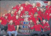  ?? AFP ?? Canada’s team celebrates after winning Davis Cup on Sunday.